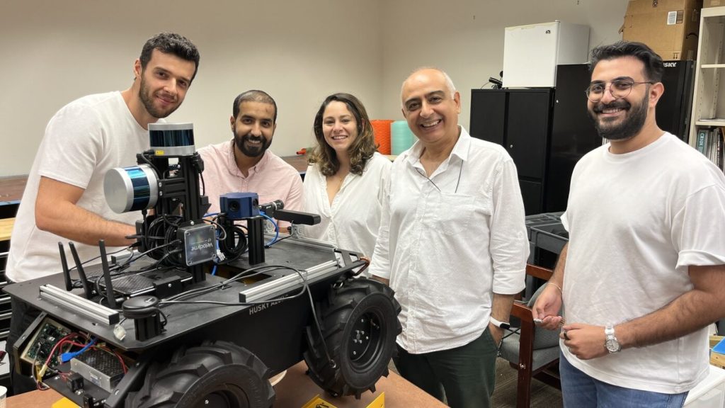 Shown are some members of the UCF CITRS lab with the autonomous Husky robot “Cypertor – the Cyber Inspector” (left to right): Furkan Lüleci, Inad Alqurashi, Mahta Zakaria, Dr. Necati Catbas, Abdulrrahman Algadi.